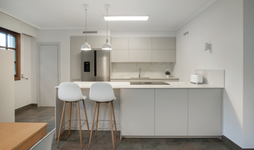 Cocina FINE en cashmere con encimera venatino gold en la Bilbaína